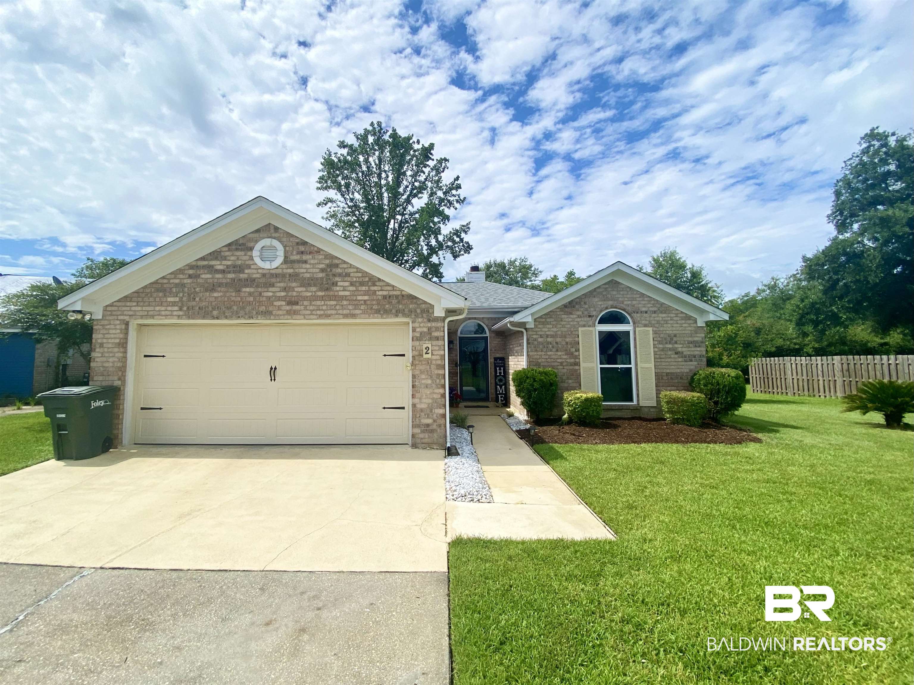 2 Windgate Court Foley, AL 36535 - Photo 2 of 28 Single story home featuring a garage and a front yard