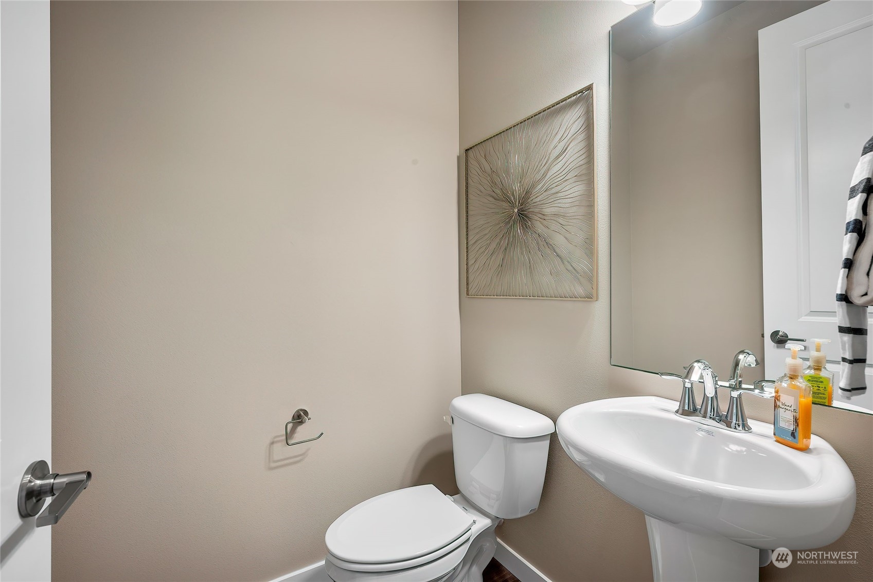 24230 Brier Road Brier, WA 98036 - Photo 17 of 40 a white toilet sitting next to a bathroom sink