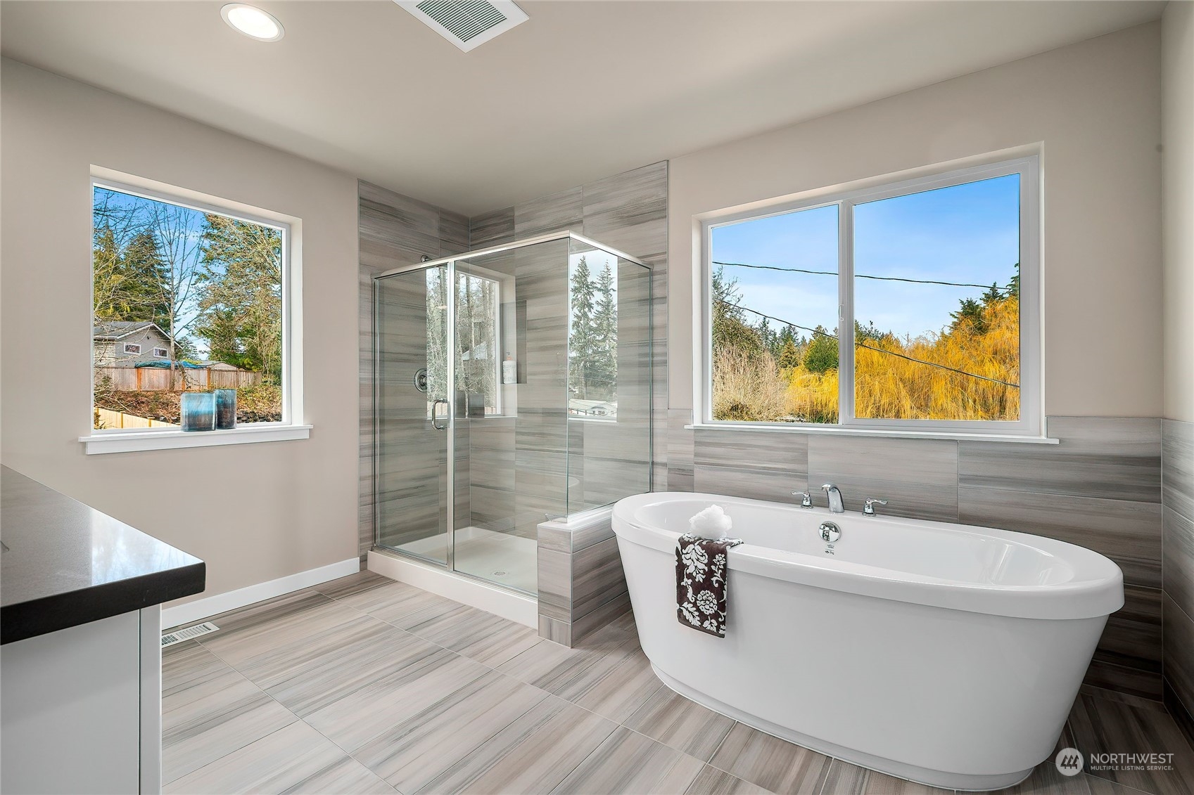 24230 Brier Road Brier, WA 98036 - Photo 22 of 40 a bathroom with a bathtub and a sink