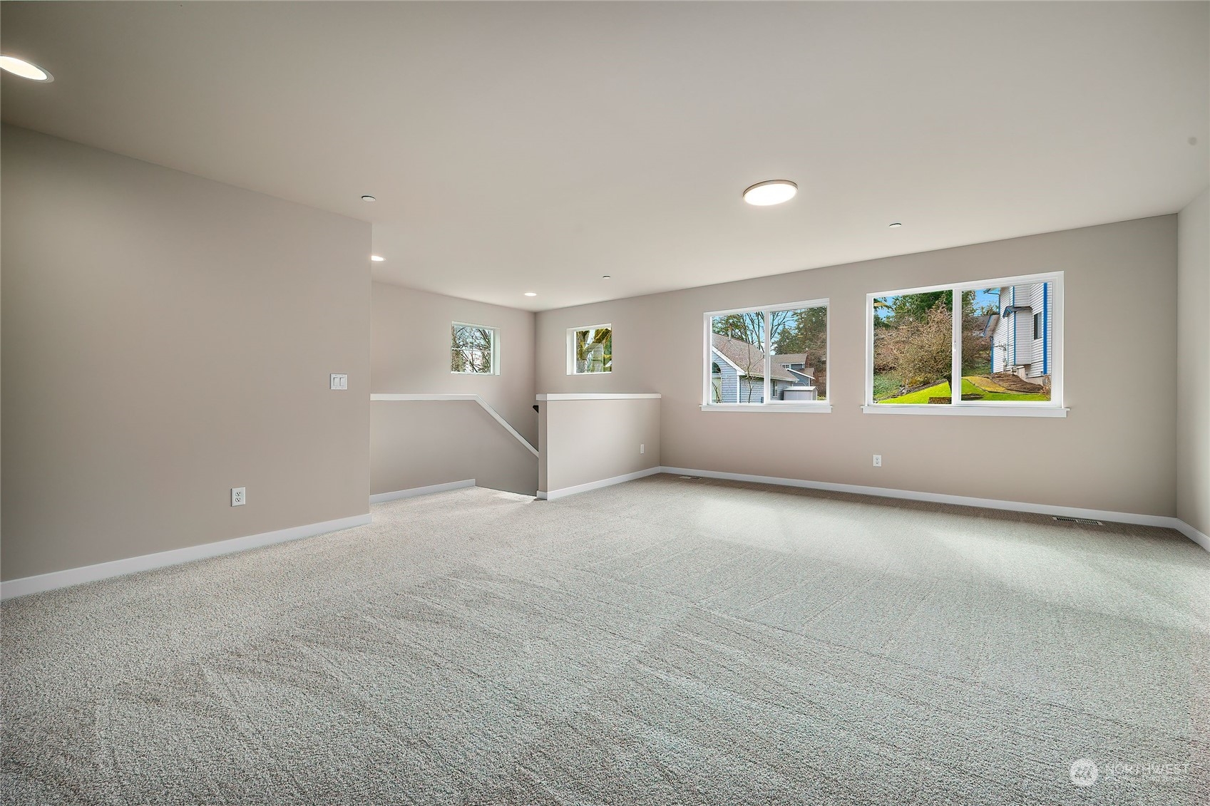 24230 Brier Road Brier, WA 98036 - Photo 25 of 40 an empty room with windows and fireplace