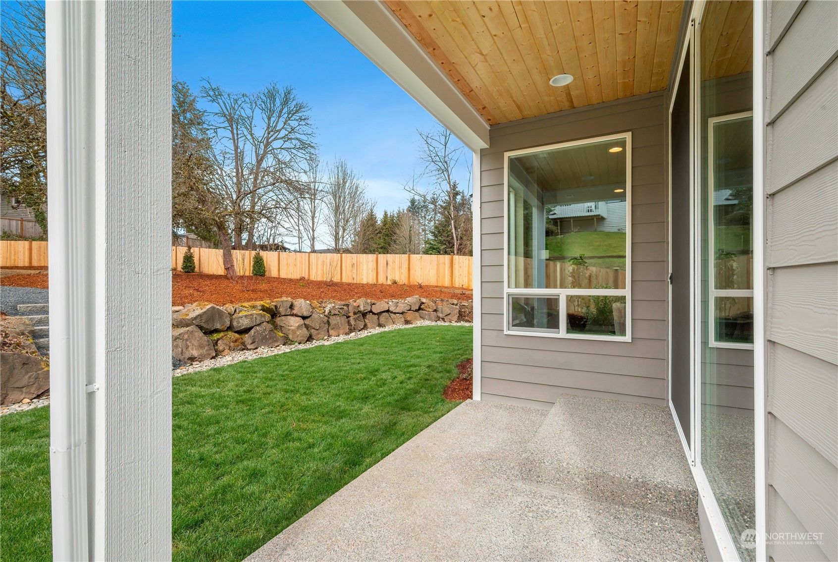 24230 Brier Road Brier, WA 98036 - Photo 31 of 40 a view of a back yard from a corridor