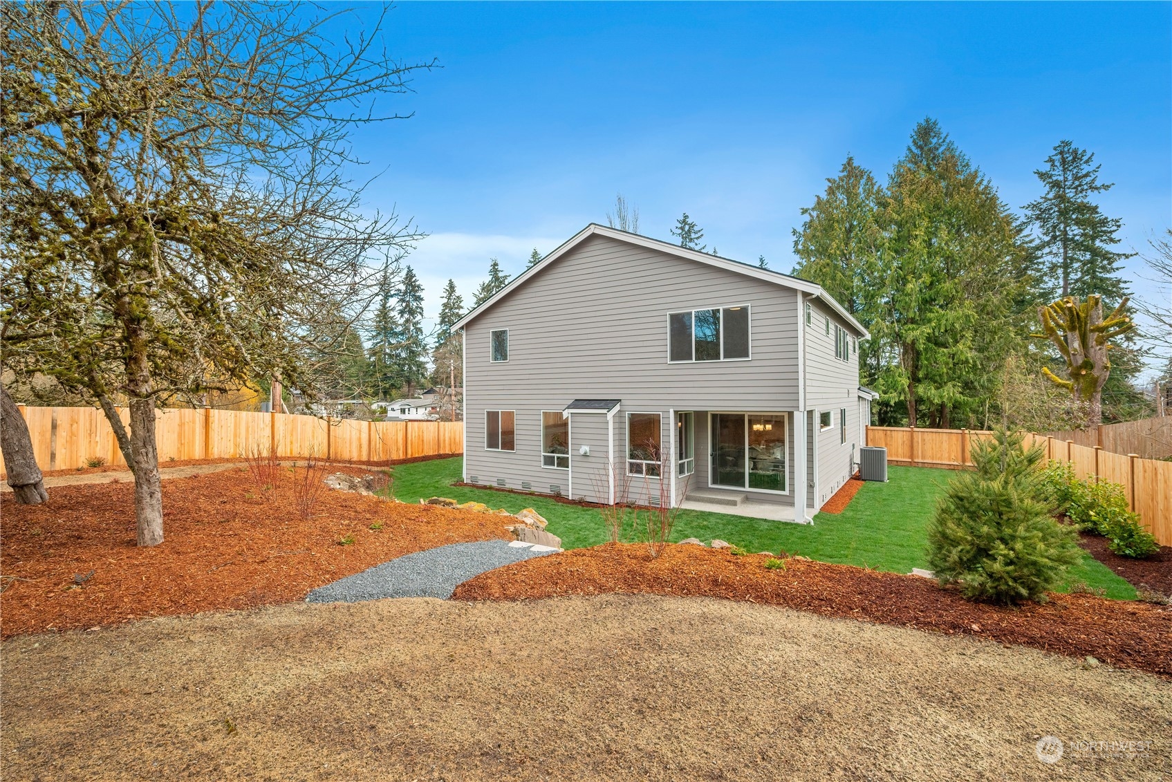 24230 Brier Road Brier, WA 98036 - Photo 36 of 40 a view of a house with a yard