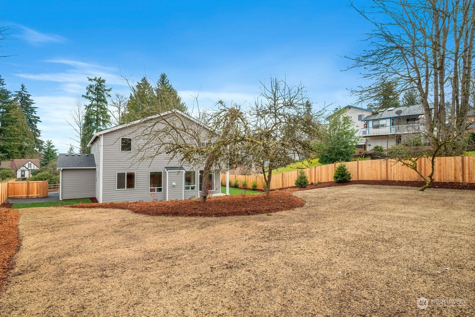 24230 Brier Road Brier, WA 98036 - Photo 37 of 40 a front view of a house with a yard and trees