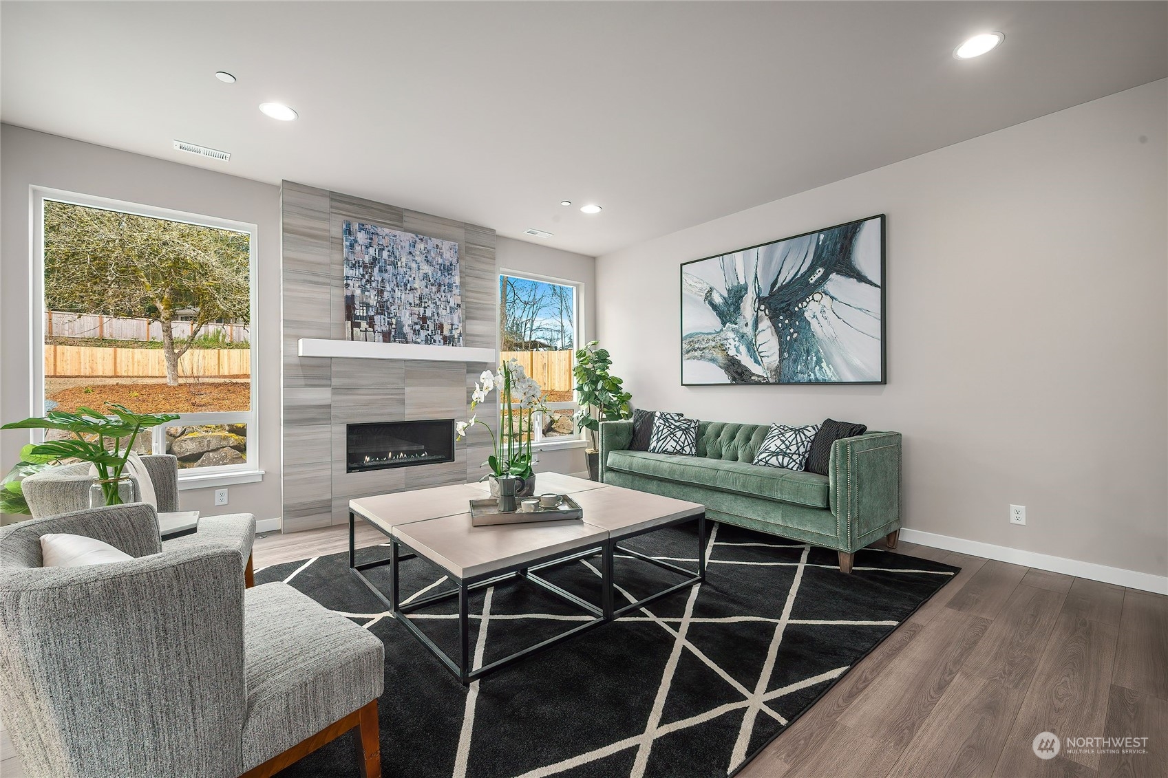 24230 Brier Road Brier, WA 98036 - Photo 10 of 40 a view of a livingroom with furniture and a fireplace