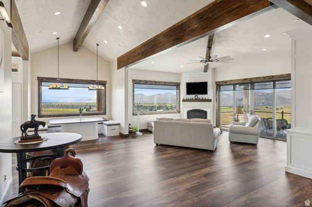 6117 North Rocky Ridge Road Peoa, UT 84061 - Photo 36 of 82 Vaulted ceiling with exposed wood beams, recessed lighting, and wood-finish flooring