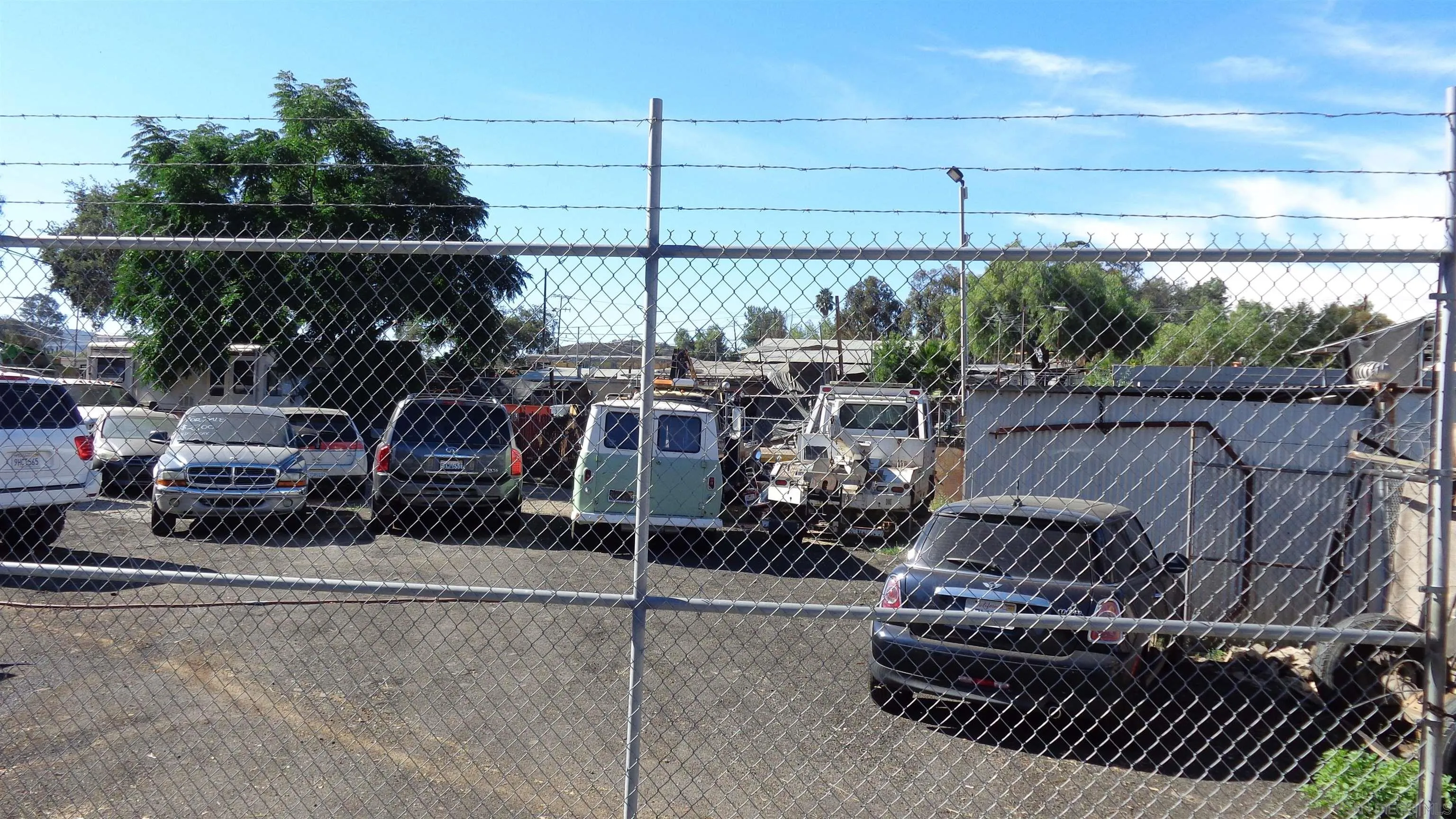 29030 Lilac Road Valley Center, CA 92082 - Photo 3 of 5 a view of a roof deck with couches chairs and wooden fence
