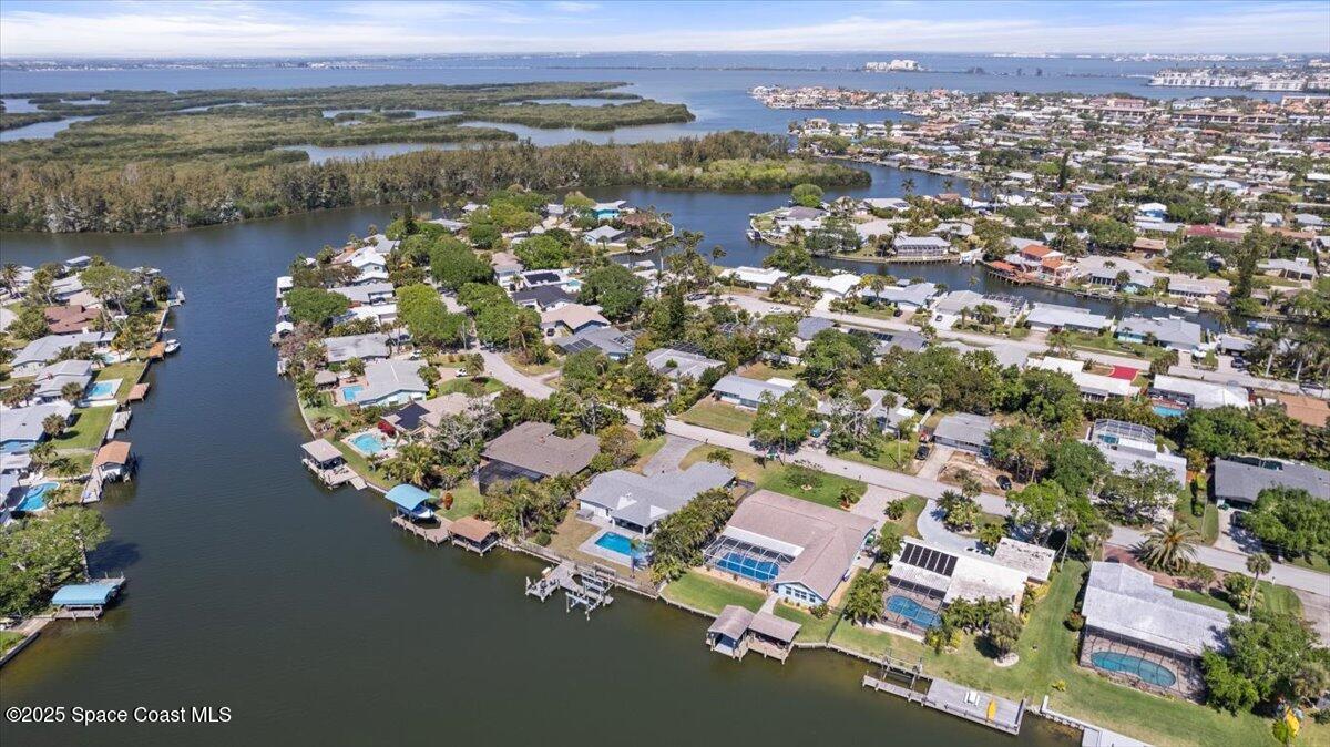 1125 Samar Road Cocoa Beach, FL 32931 - Photo 44 of 46 an aerial view of residential house with outdoor space and lake view