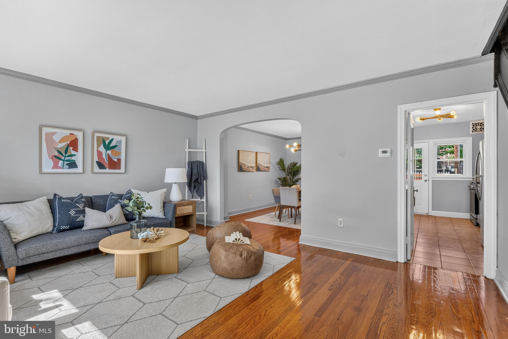 3906 Yolando Road Baltimore, MD 21218 - Photo 2 of 30 a living room with furniture and wooden floor