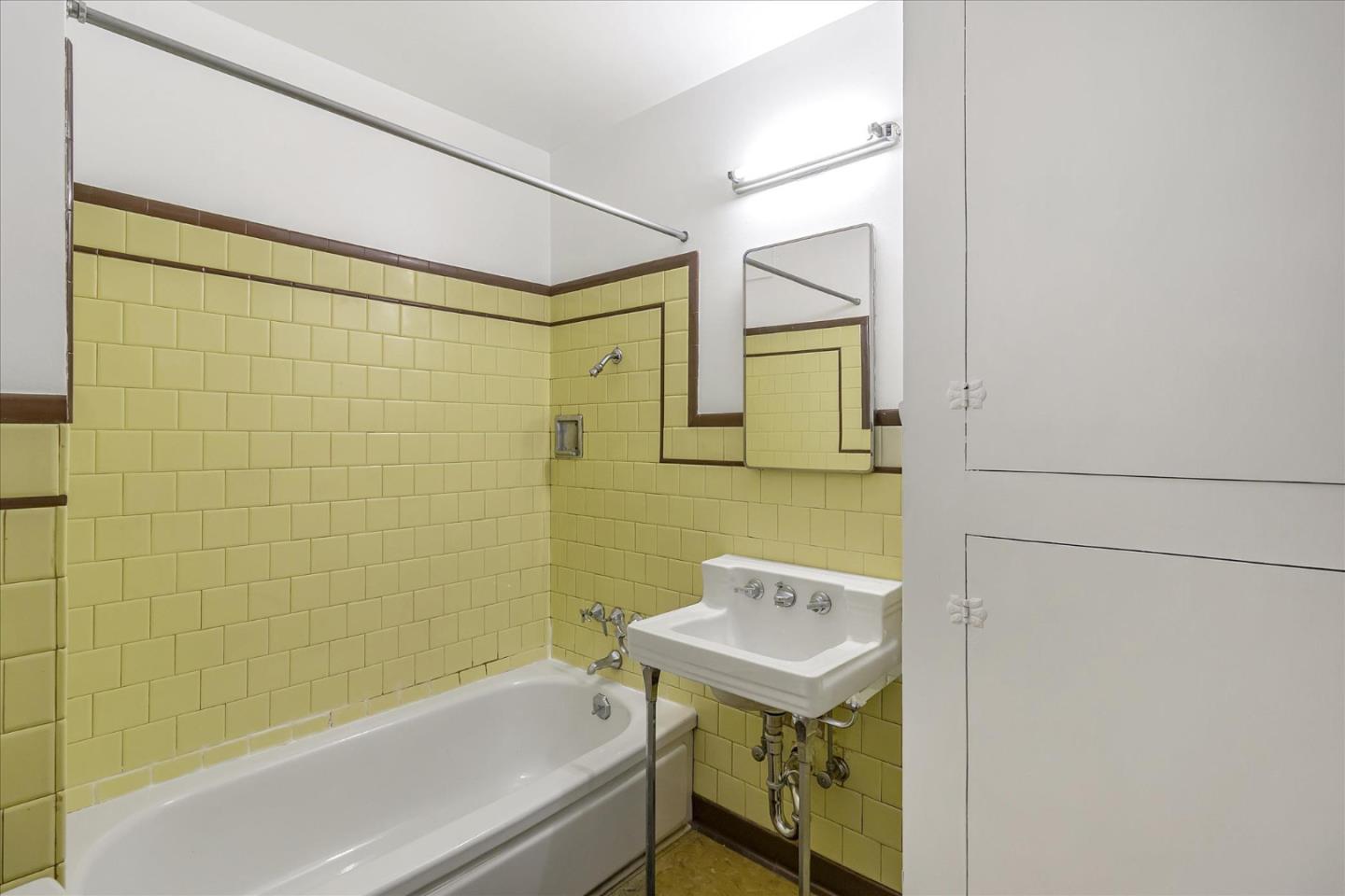 508 Park Boulevard Millbrae, CA 94030 - Photo 11 of 24 a bathroom with a sink and a bathtub