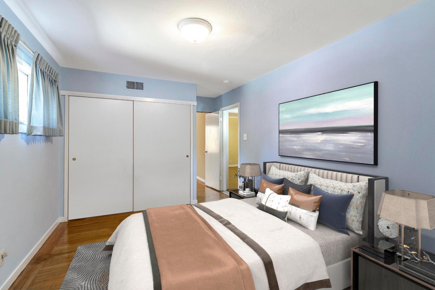 508 Park Boulevard Millbrae, CA 94030 - Photo 15 of 24 a bedroom with a bed and a painting on the wall