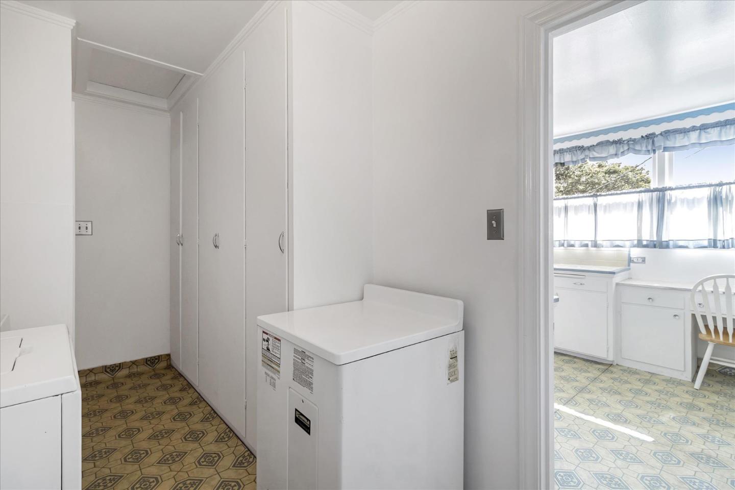 508 Park Boulevard Millbrae, CA 94030 - Photo 16 of 24 a utility room with dryer and washer