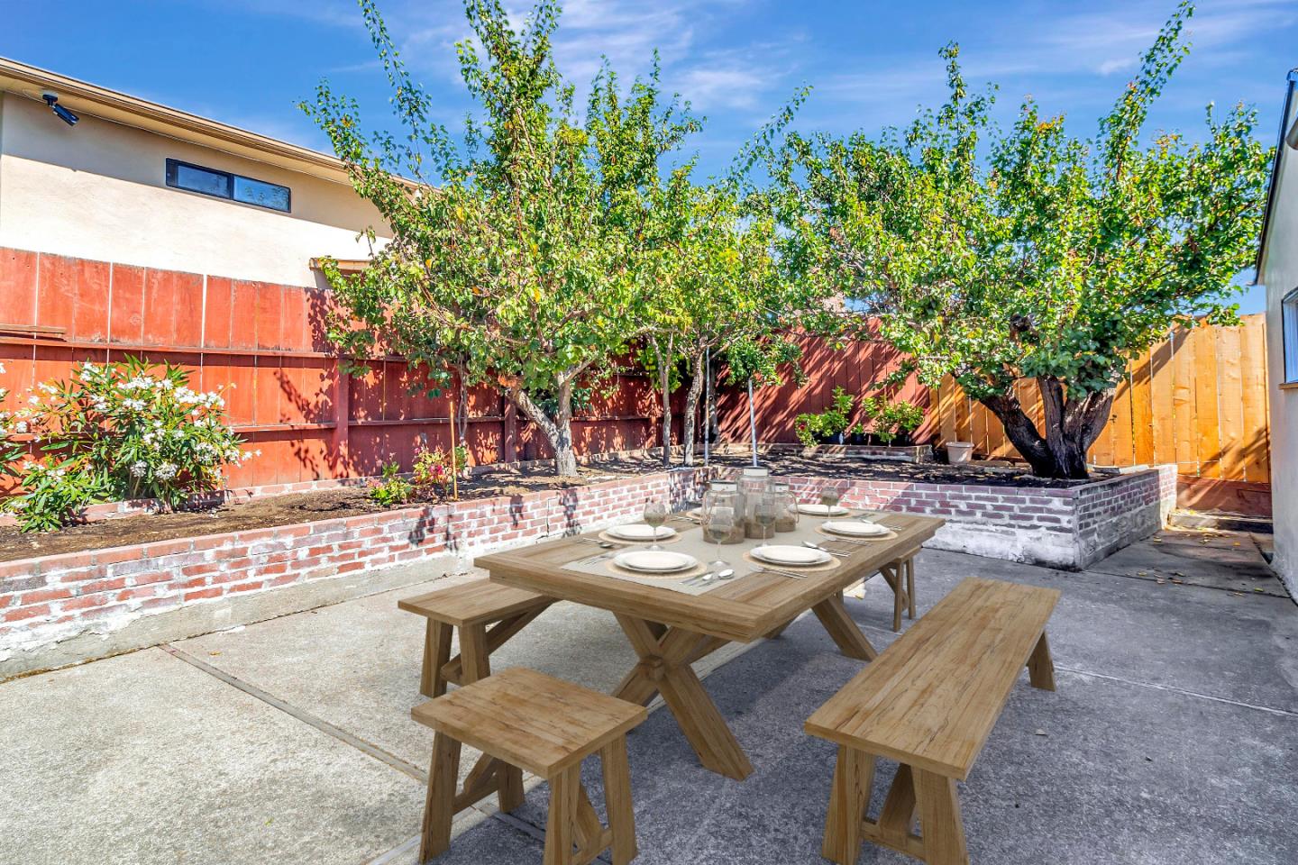508 Park Boulevard Millbrae, CA 94030 - Photo 21 of 24 a view of a patio with table and chairs and potted plants