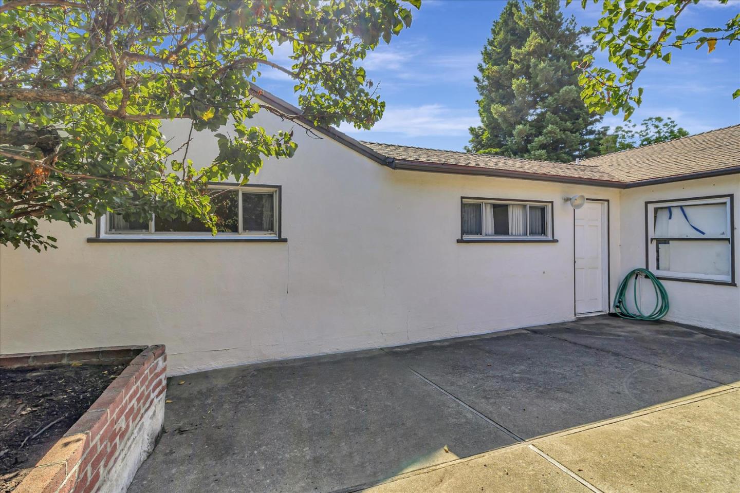 508 Park Boulevard Millbrae, CA 94030 - Photo 22 of 24 a view of backyard and kitchen