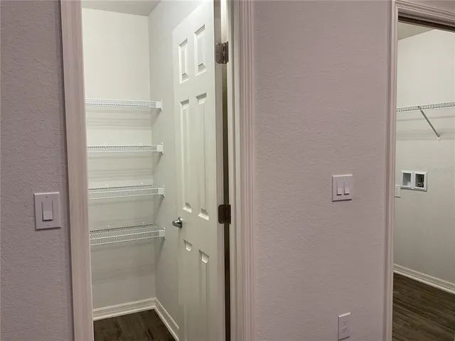 a bathroom with a toilet a sink and bathtub