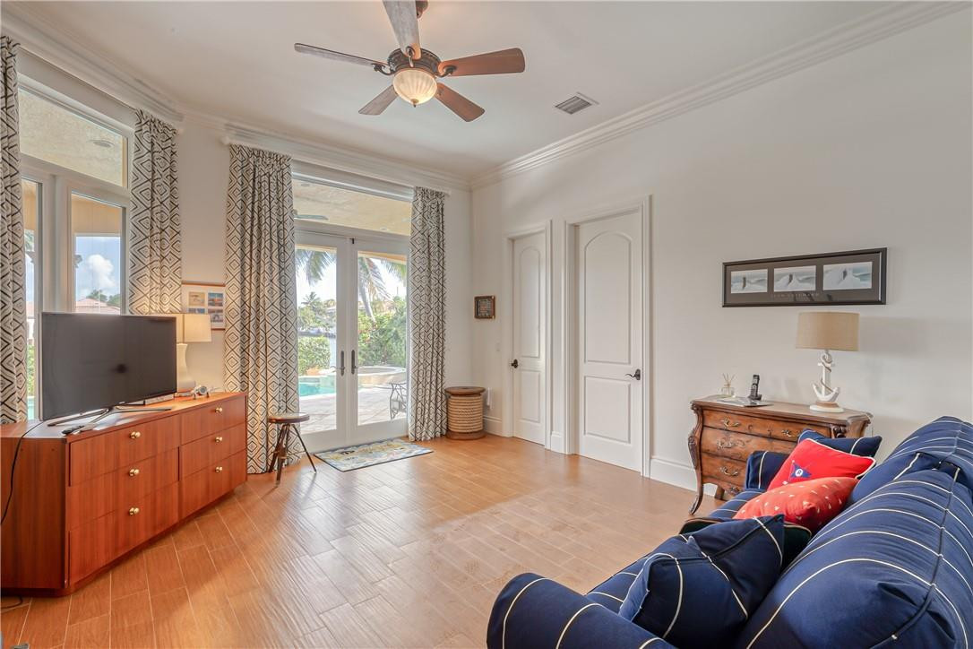 2320 Northeast 34th Court Lighthouse Point, FL 33064 - Photo 24 of 97 Bedroom with doors to patio and pool