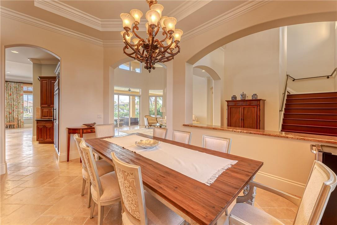 2320 Northeast 34th Court Lighthouse Point, FL 33064 - Photo 7 of 97 Formal dining room with custom lighting