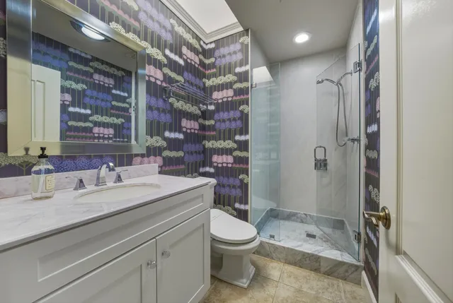 a bedroom with a bed and with furniture