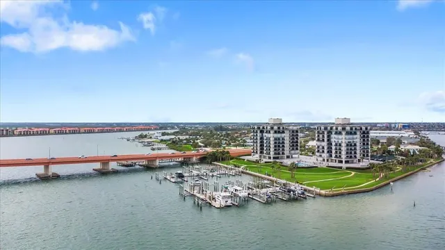 an aerial view of a house with a lake view