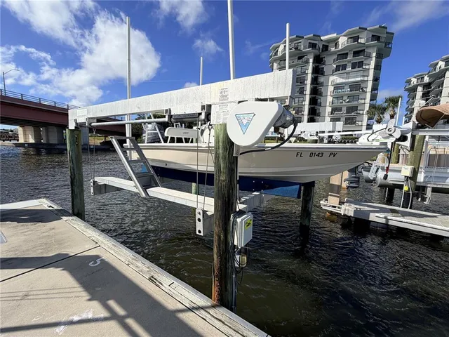 a view of a balcony with two chairs