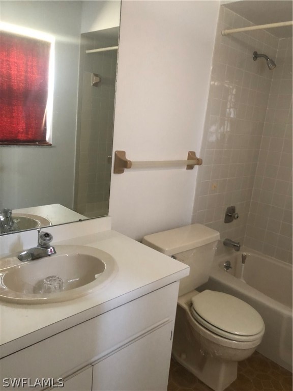 358 Delaware Road Lehigh Acres, FL 33936 - Photo 17 of 22 a bathroom with a sink and toilet