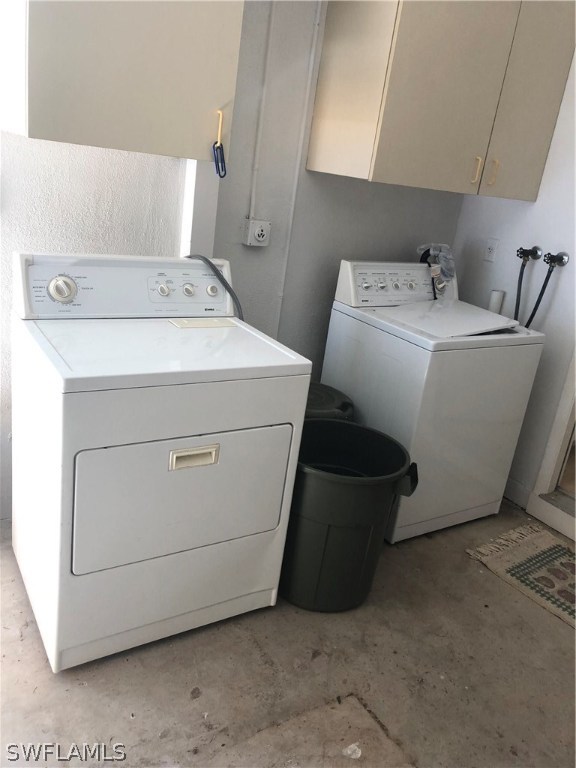 358 Delaware Road Lehigh Acres, FL 33936 - Photo 18 of 22 a utility room with dryer and washer
