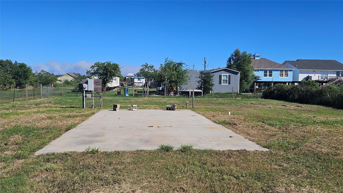 303 15th Street Dickinson, TX 77539 - Photo 3 of 6 a view of a house with a yard