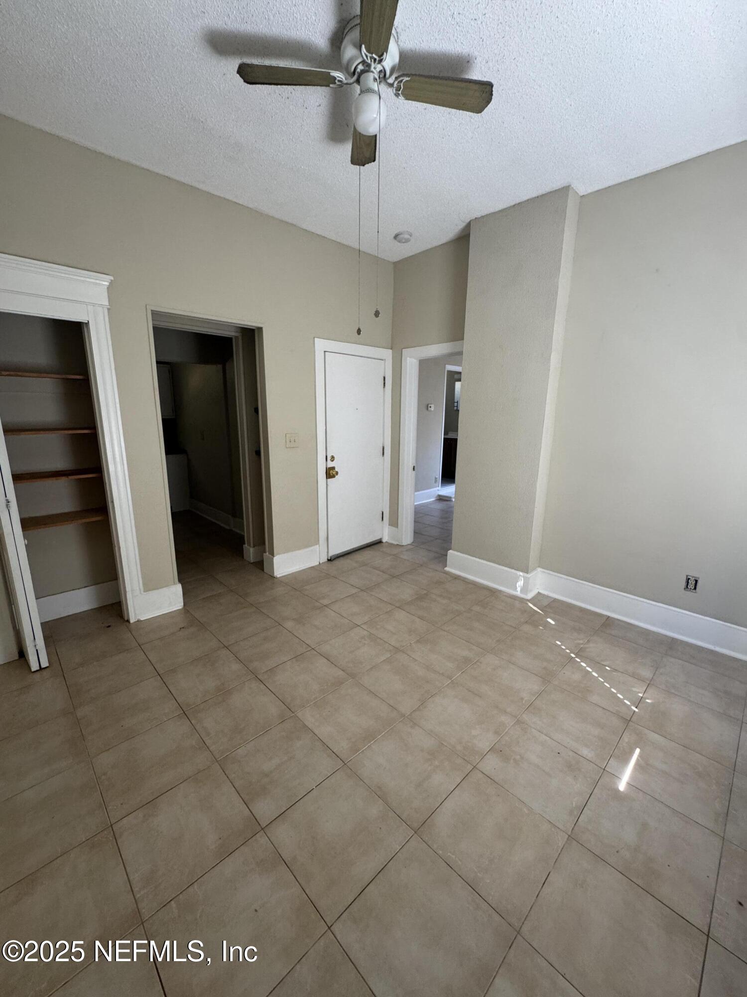 1604 Cherry Street, Unit 4 Jacksonville, FL 32205 - Photo 7 of 11 a view of empty room with a ceiling fan