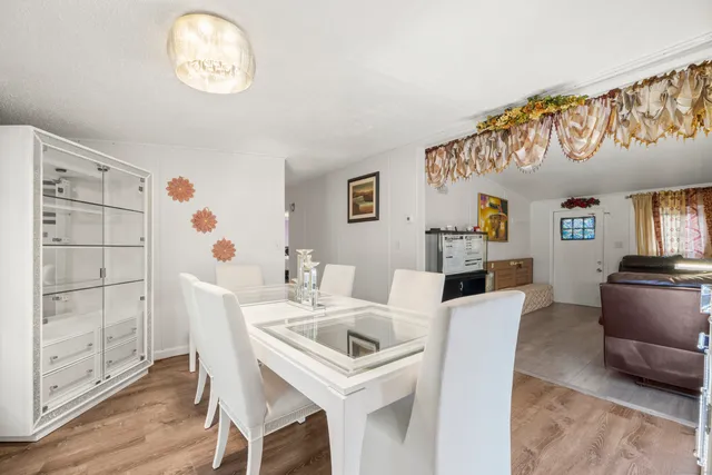 a view of a dining room with furniture