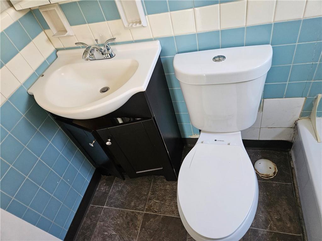 1907 Hanover Street, Unit 8 Swissvale, PA 15218 - Photo 12 of 23 a bathroom with a toilet and a sink