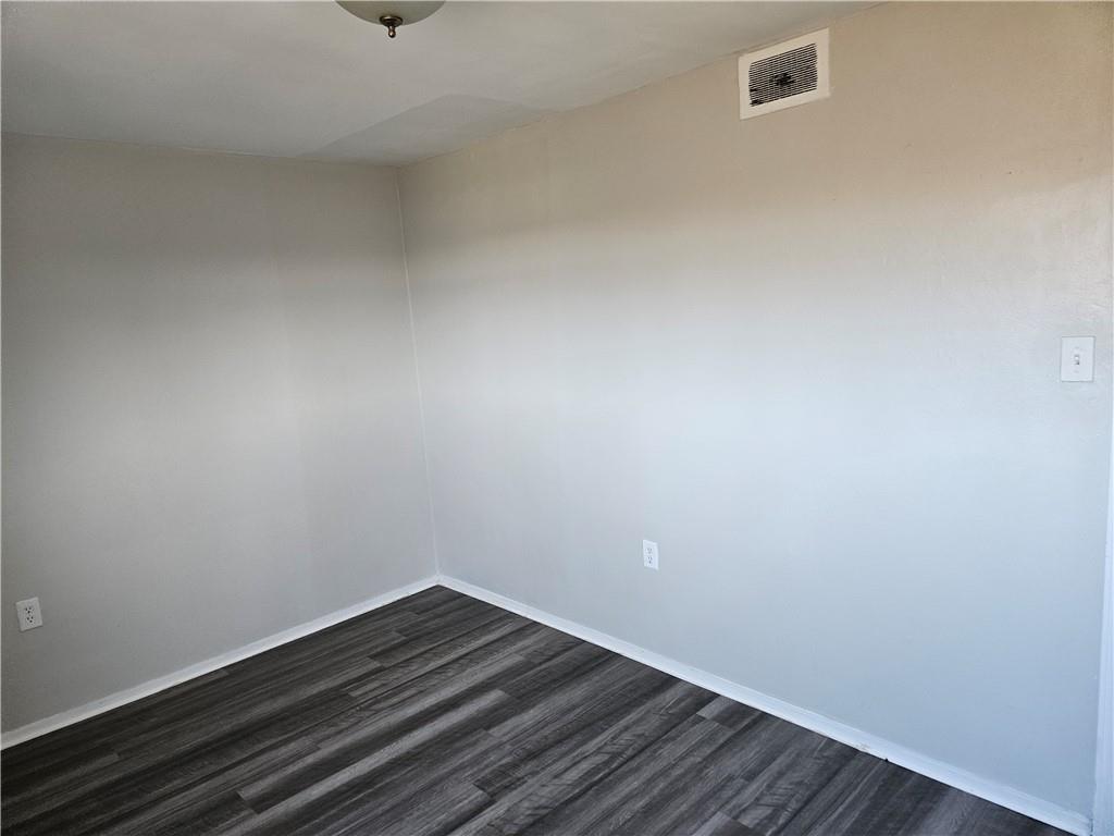 1907 Hanover Street, Unit 8 Swissvale, PA 15218 - Photo 18 of 23 a view of small space with wooden floor and fan