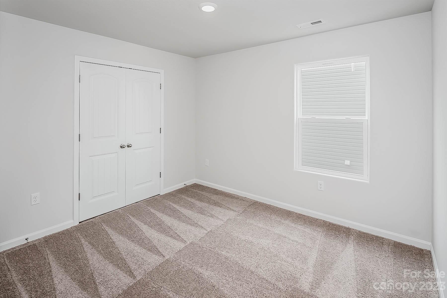 1737 Nia Road Charlotte, NC 28215 - Photo 15 of 15 a view of an empty room with a window