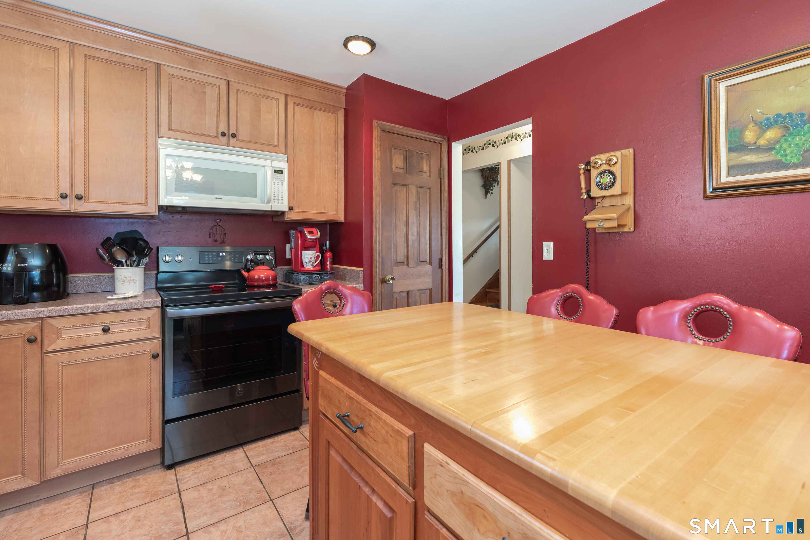 165 Community House Road Southbury, CT 06488 - Photo 14 of 29 a kitchen with granite countertop cabinets and window