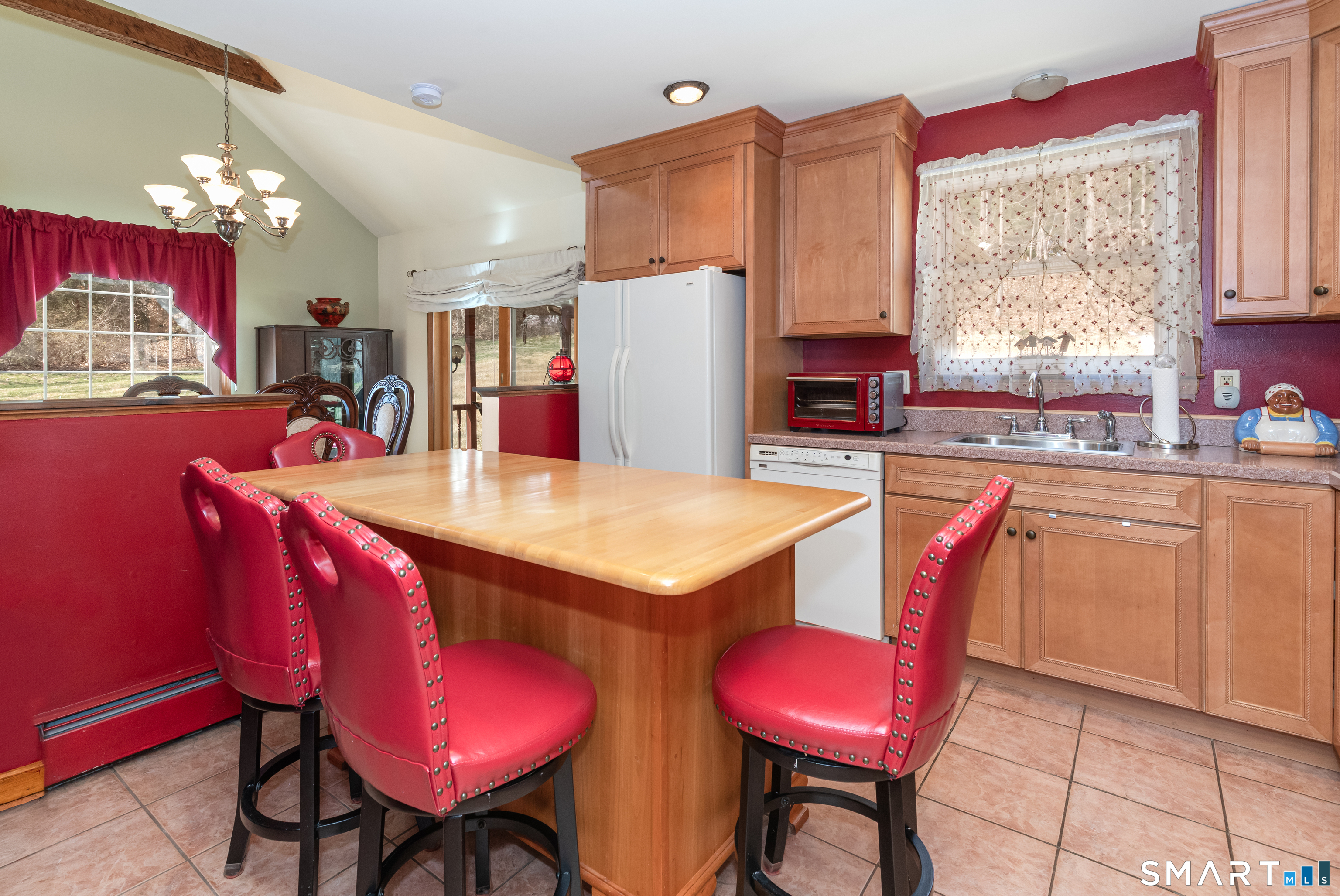 165 Community House Road Southbury, CT 06488 - Photo 15 of 29 a view of a dining room with furniture