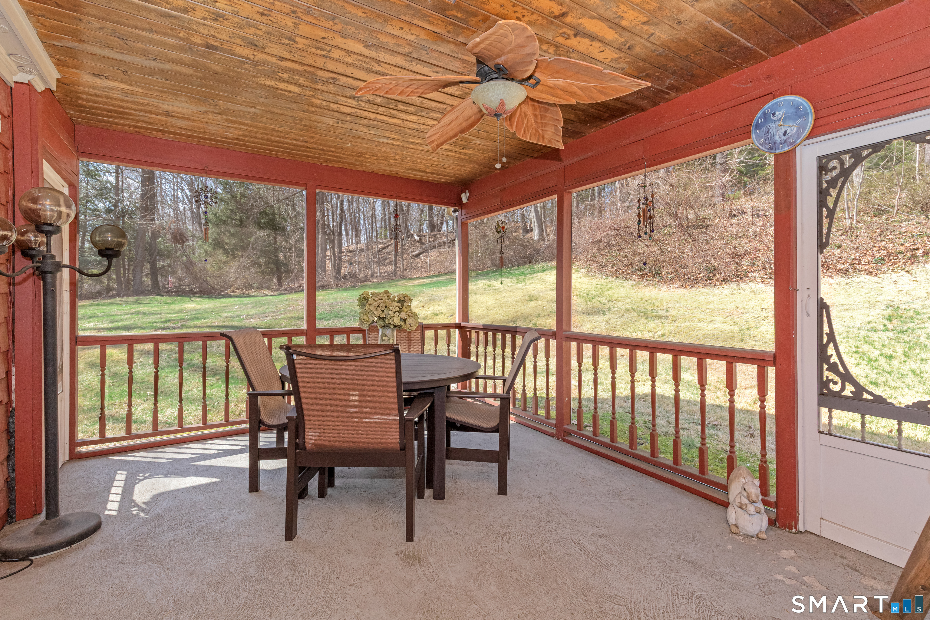 165 Community House Road Southbury, CT 06488 - Photo 16 of 29 a view of a patio with a table chairs and a table