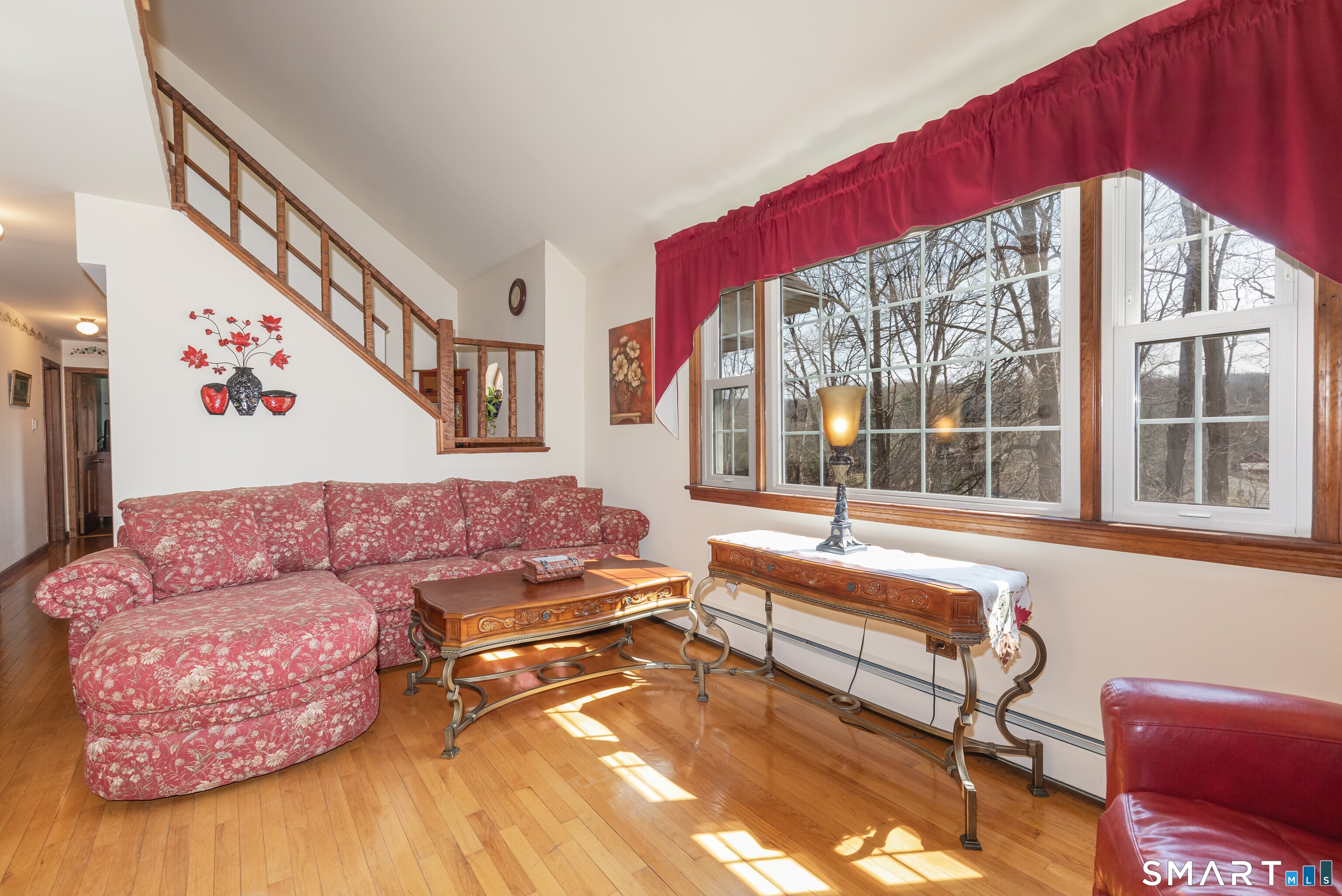165 Community House Road Southbury, CT 06488 - Photo 2 of 29 a living room with furniture and a large window