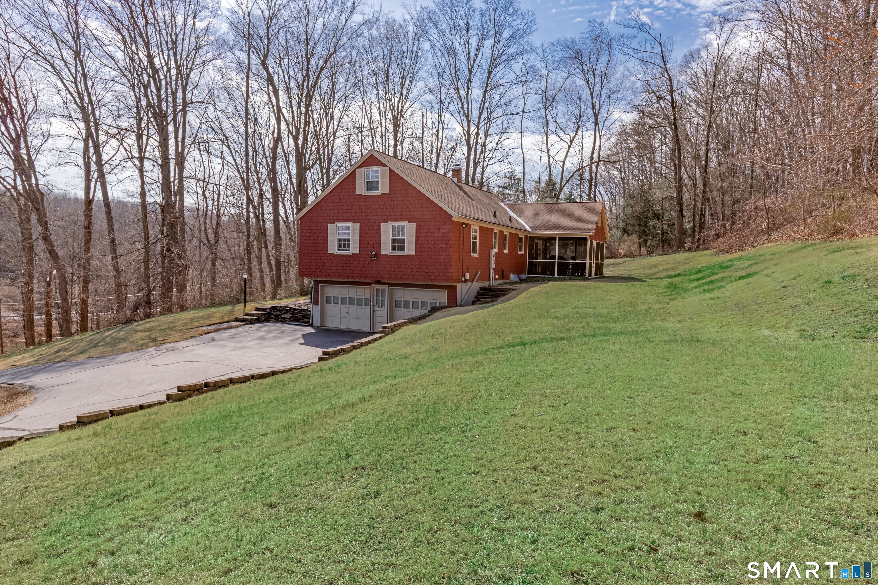 165 Community House Road Southbury, CT 06488 - Photo 23 of 29 a front view of a house with a yard and garage