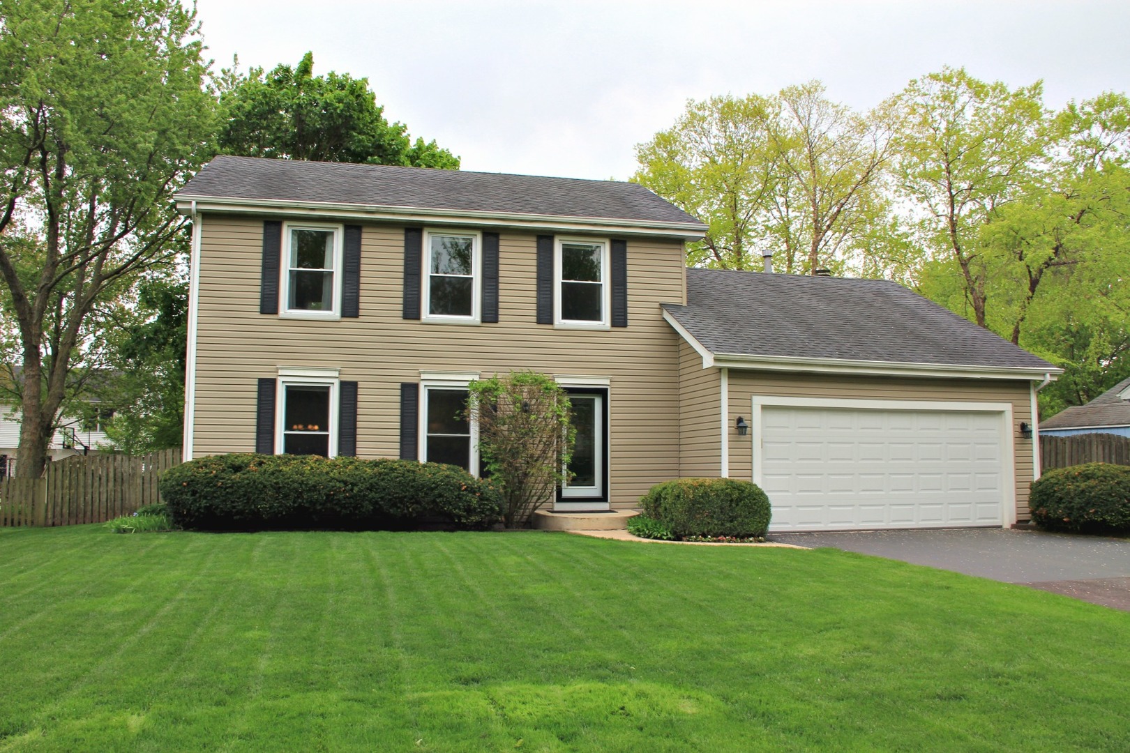 1316 Giese Road Batavia, IL 60510 - Photo 1 of 28 a front view of a house with a garden
