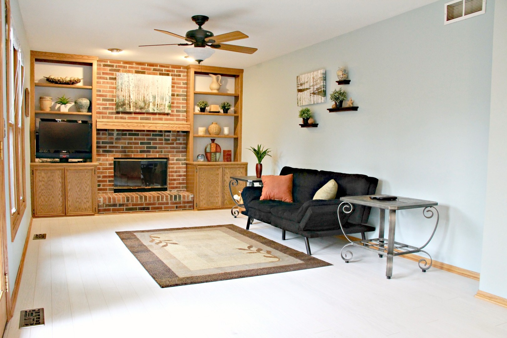 1316 Giese Road Batavia, IL 60510 - Photo 11 of 28 a living room with furniture and a fireplace
