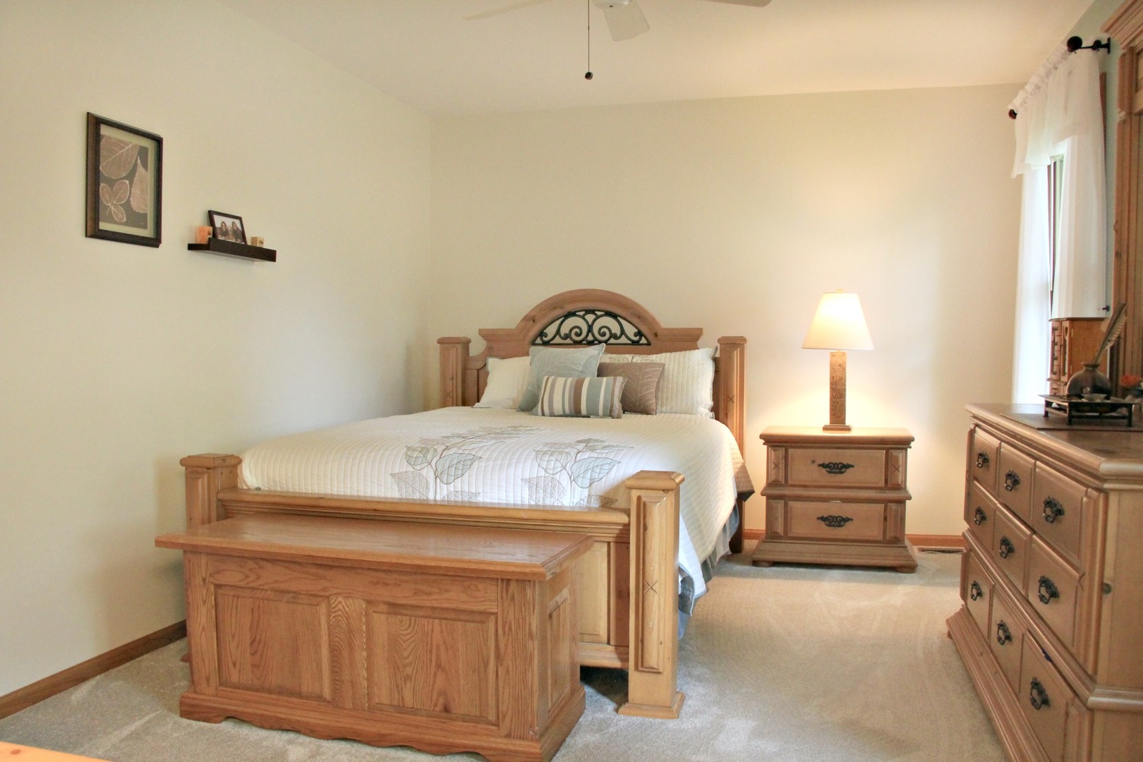 1316 Giese Road Batavia, IL 60510 - Photo 14 of 28 a bedroom with a bed and a dresser