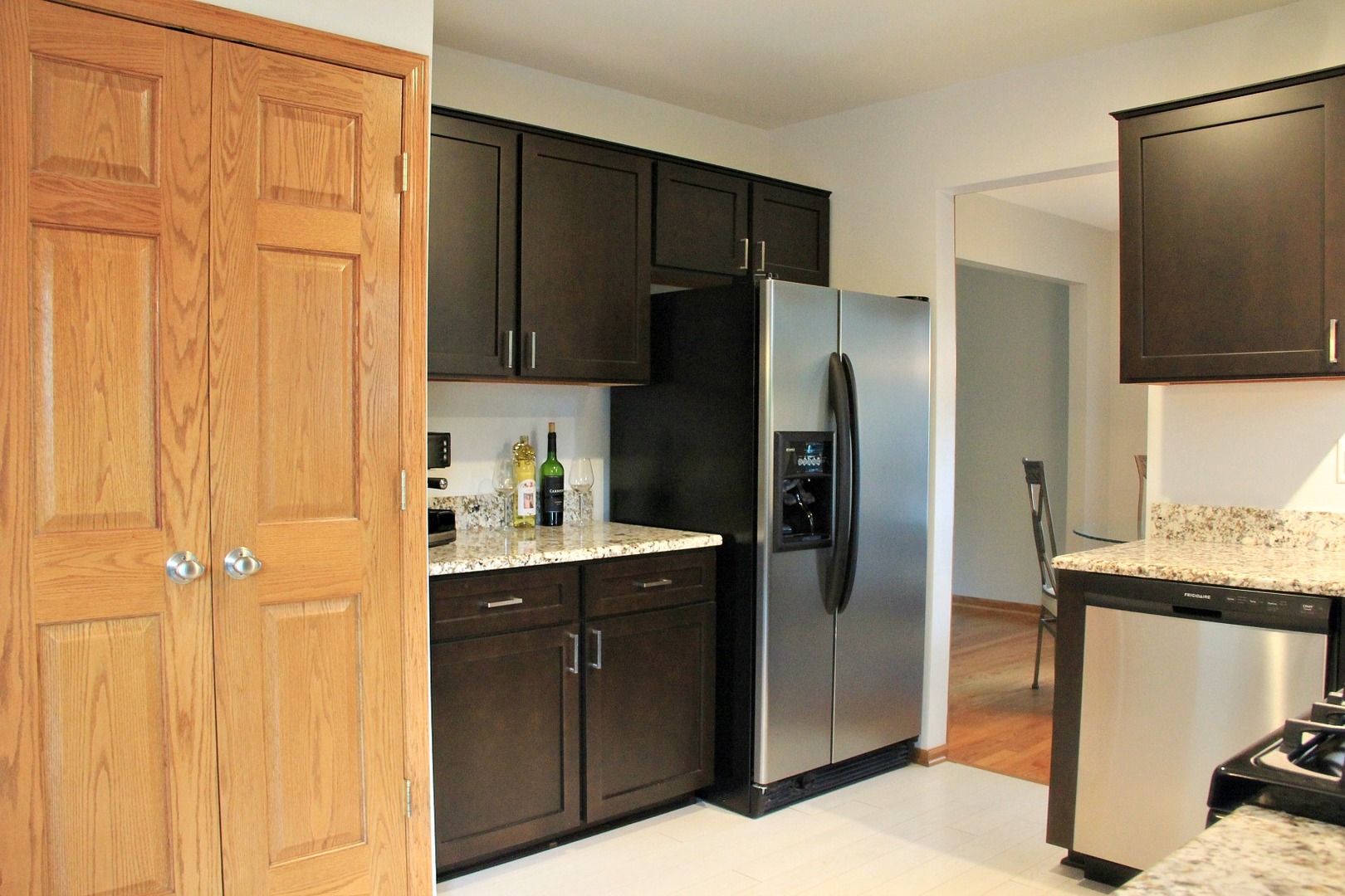 1316 Giese Road Batavia, IL 60510 - Photo 8 of 28 a kitchen with stainless steel appliances granite countertop a refrigerator and a sink