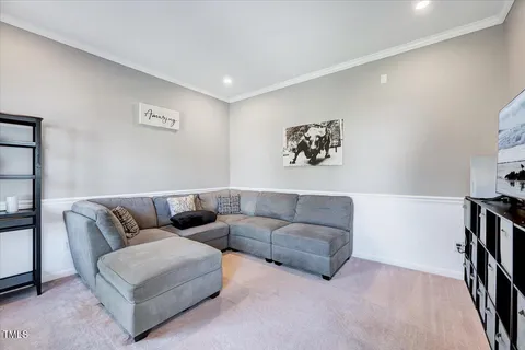 a living room with furniture and a couch