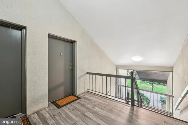 a view of entryway with wooden floor