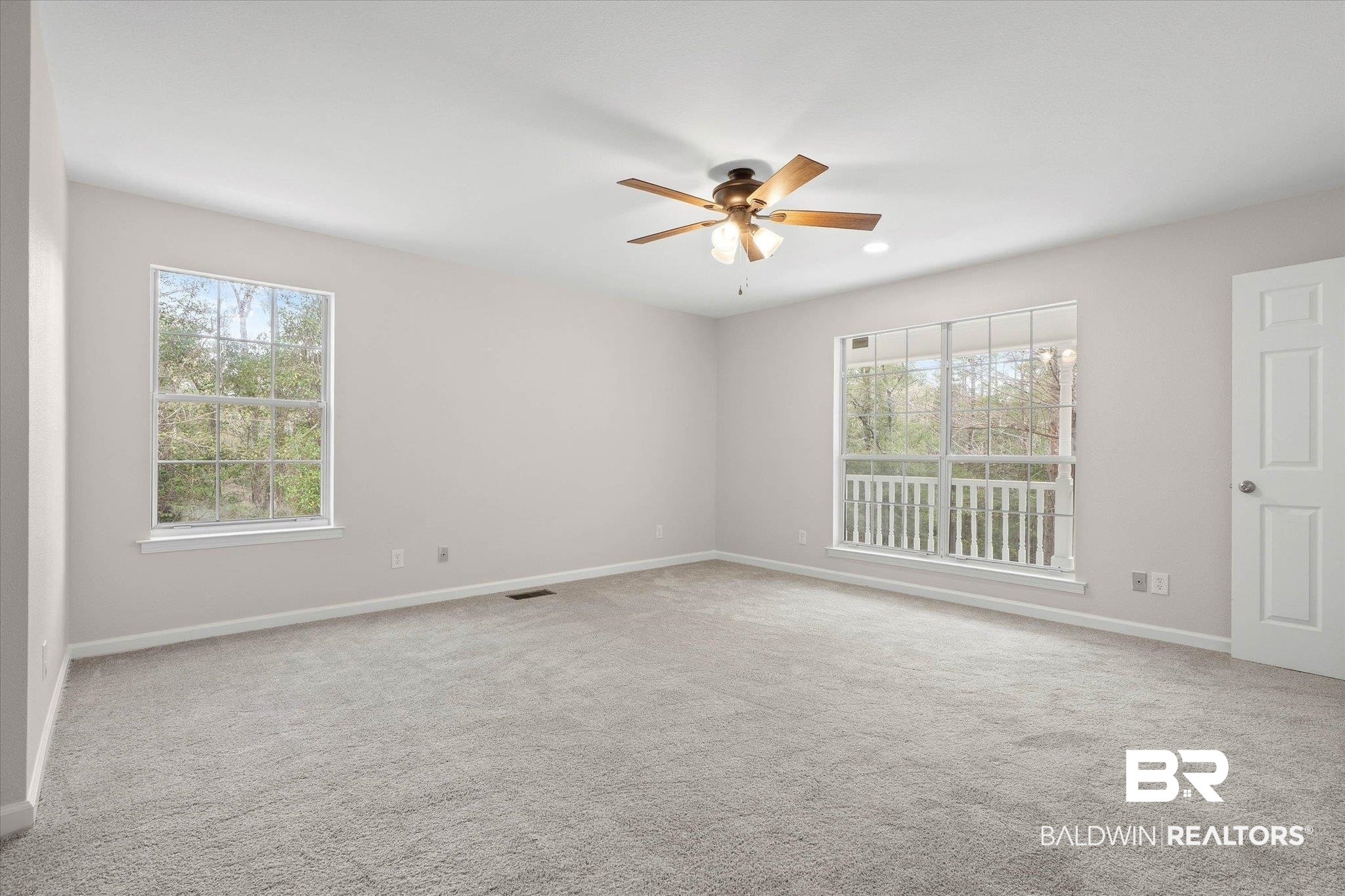 106 Melanie Loop Daphne, AL 36526 - Photo 13 of 45 Unfurnished room with light carpet and ceiling fan