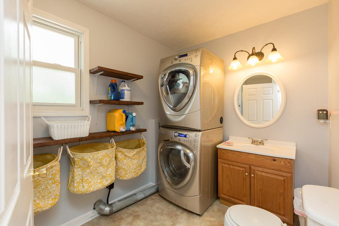 606 Larkin Springs Road Madison, TN 37115 - Photo 17 of 20 a utility room with dryer and washer