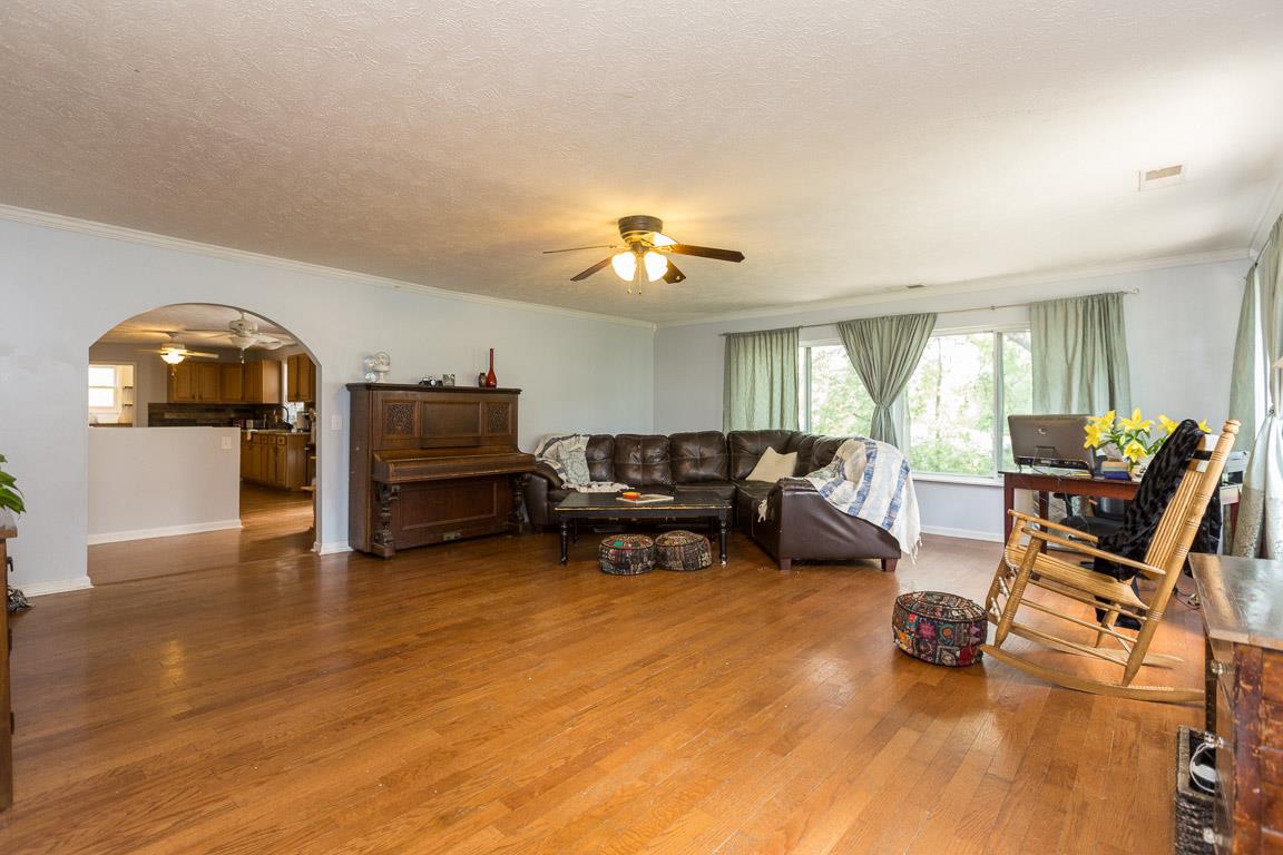 606 Larkin Springs Road Madison, TN 37115 - Photo 3 of 20 a living room with furniture and a wooden floor