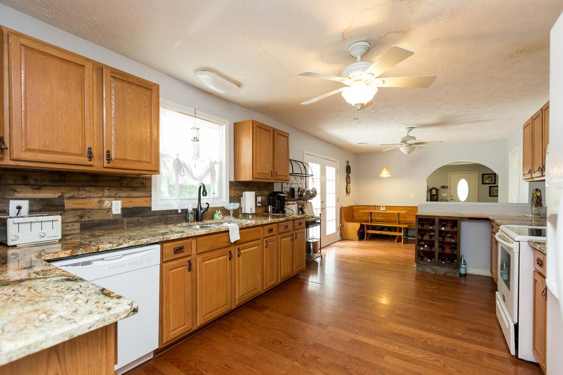 606 Larkin Springs Road Madison, TN 37115 - Photo 5 of 20 a kitchen with lots of counter top space and appliances