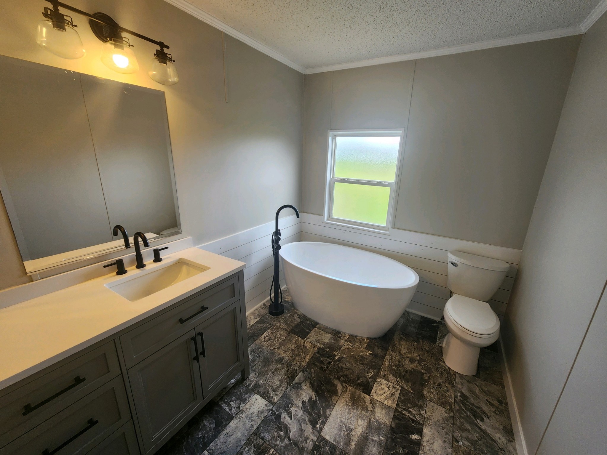 1056 Caney Branch Road Morrison, TN 37357 - Photo 8 of 12 a bathroom with a toilet sink and mirror