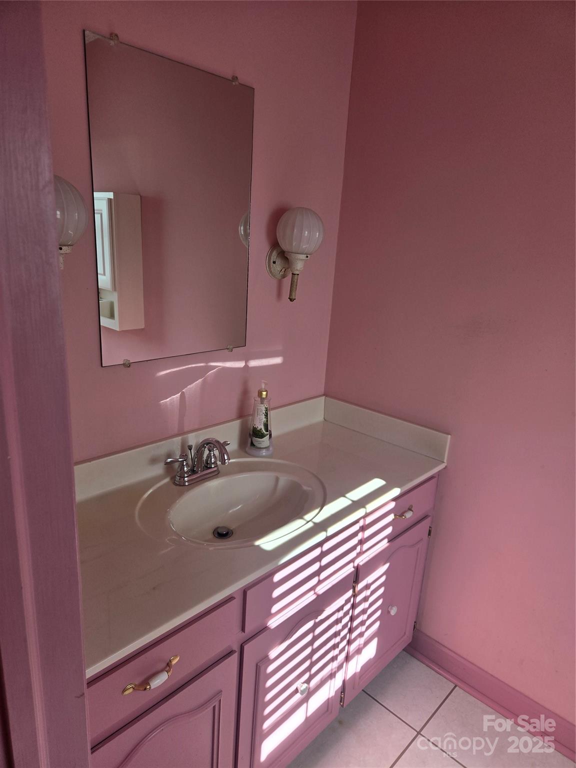 800 Andrew Mills Road Bostic, NC 28018 - Photo 15 of 19 a bathroom with a sink and a mirror