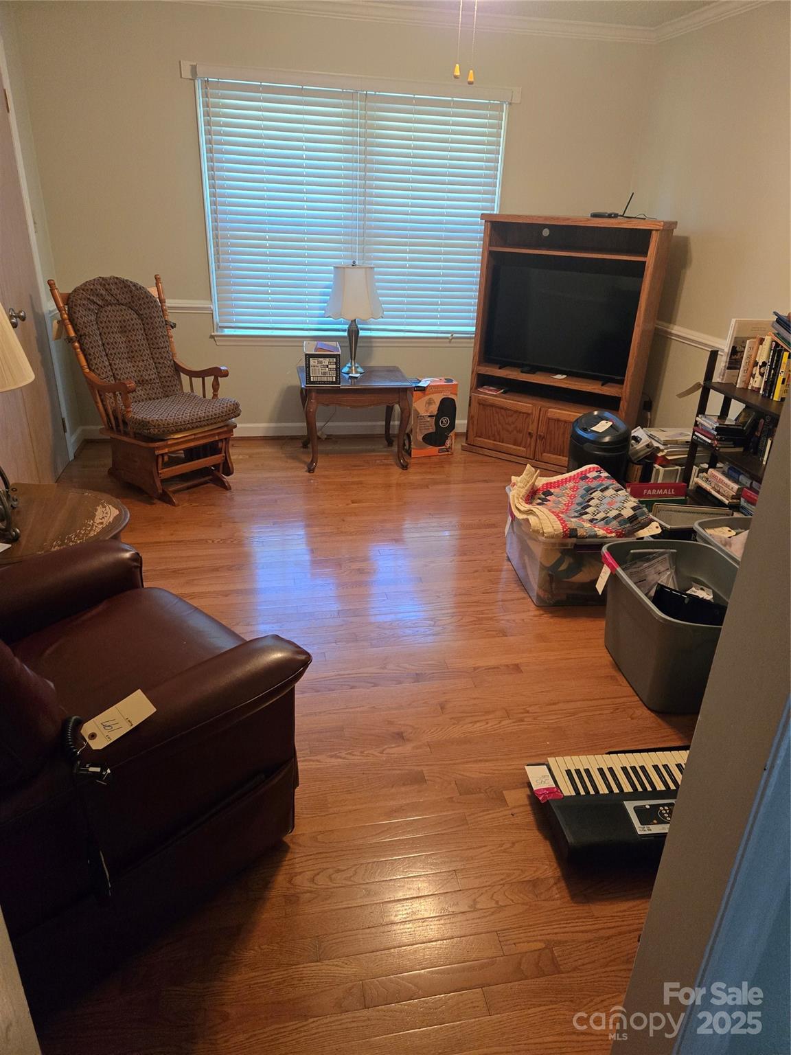 800 Andrew Mills Road Bostic, NC 28018 - Photo 17 of 19 a living room with furniture and a flat screen tv