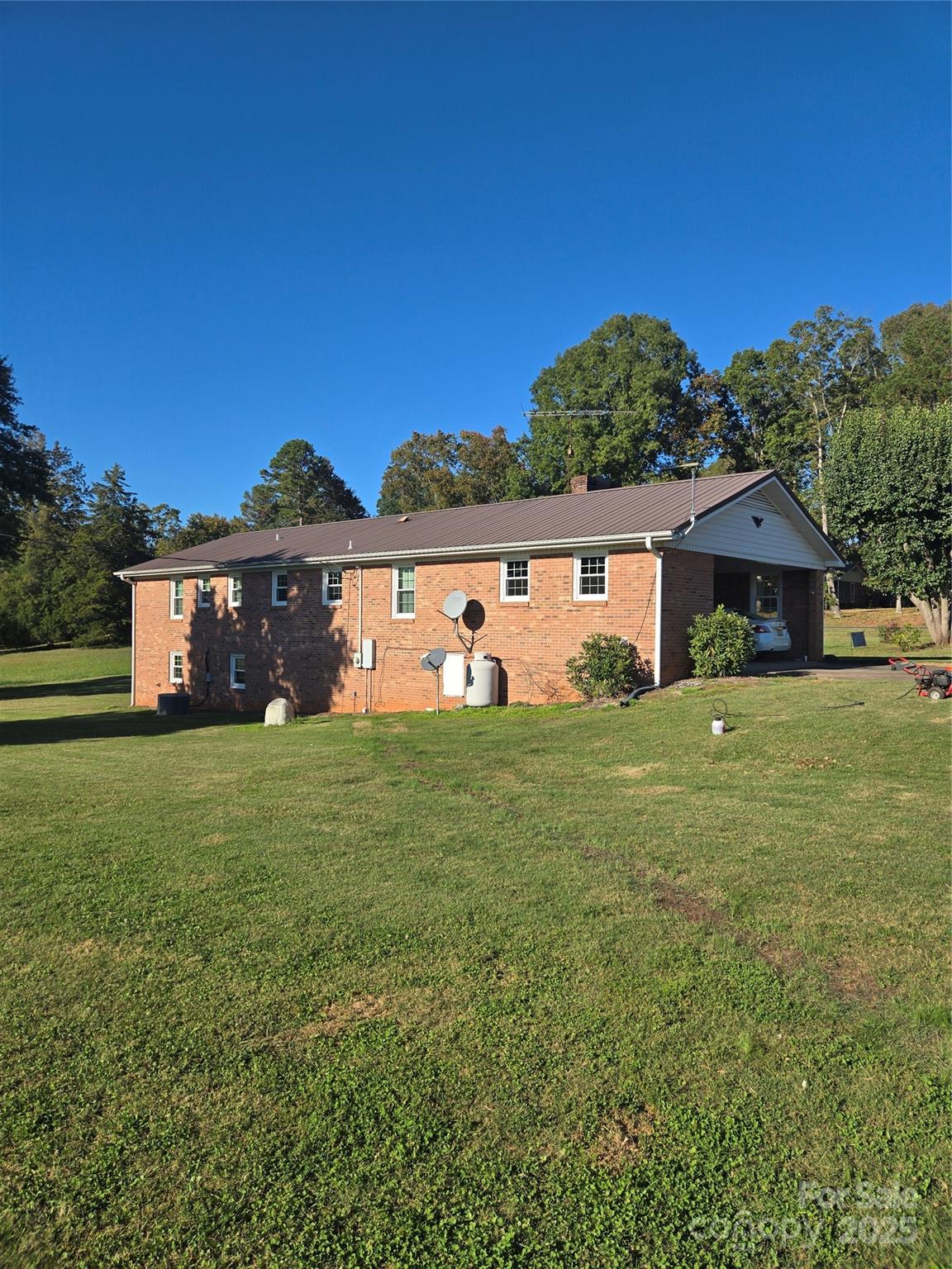 800 Andrew Mills Road Bostic, NC 28018 - Photo 4 of 19 a front view of a house with garden